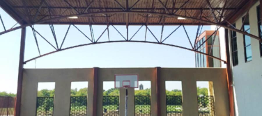 Harvey E. Najim Family YMCA’s Basketball court with curved joist