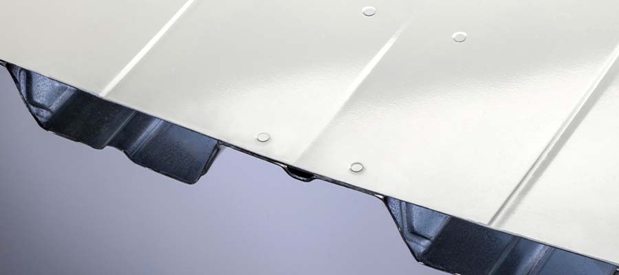 Riveted cellular deck is available in galvanized, white primer and premium finishes.